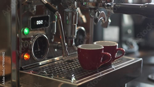 espresso machine pouring espresso coffee photo