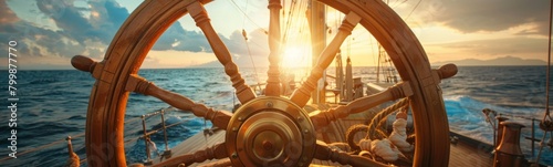 Steering wheel of a boat with a sunset in the background. Banner photo