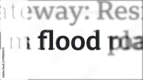 Mentioning flood in media headlines. Problem of climate change. Quickly changing pages of online publications. Close-up of letters
