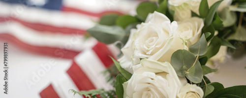 Honoring the Brave with White Roses and the American Flag