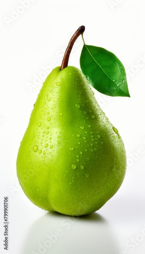 A green pear with water drops on it.