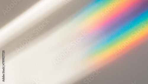 Abstract rainbow rays of light shadow overlay effect from sunlight on a white background, mockup and backdrop