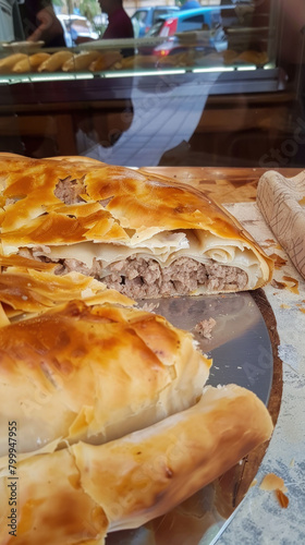 Savory Meat-Filled Burek Delight, Culinary World Tour, Food and Street Food photo