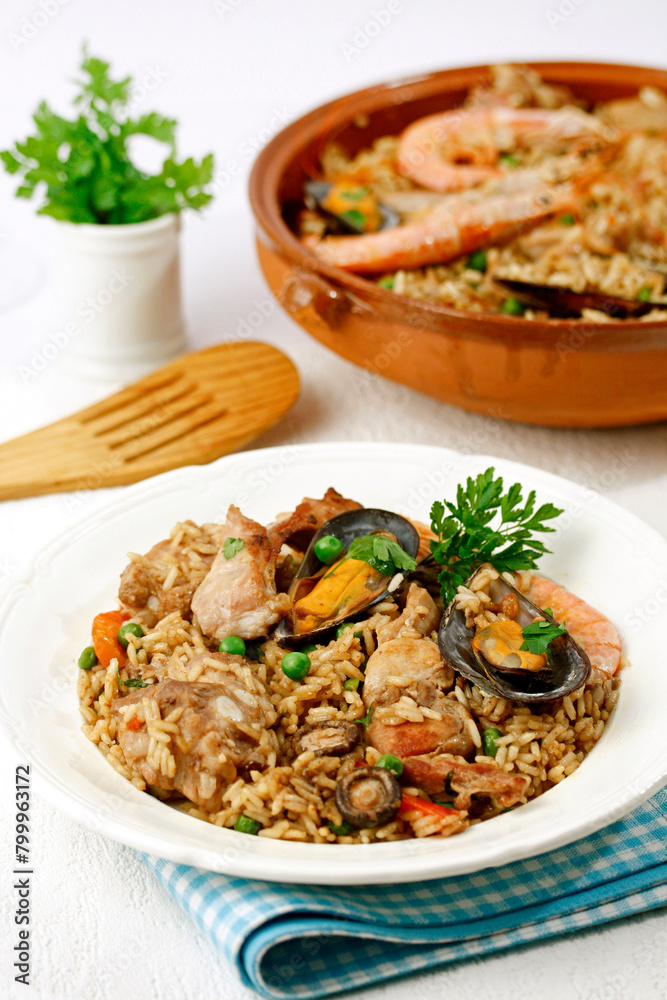 Rice casserole with pork and shellfish. Rice casserole with pork and shellfish.
