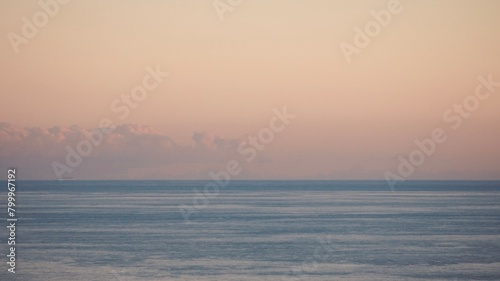 Horizon over the sea minimalist seascape with space for text  calm blue sea and sunset sky great panoramic aerial view. 