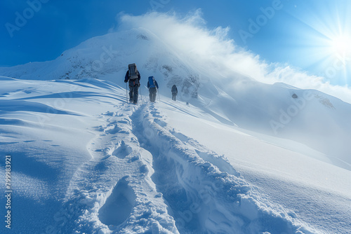 climbers climbing to the top of the mountain through snow and storm © Collorio