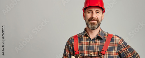 Confident construction worker with helmet photo