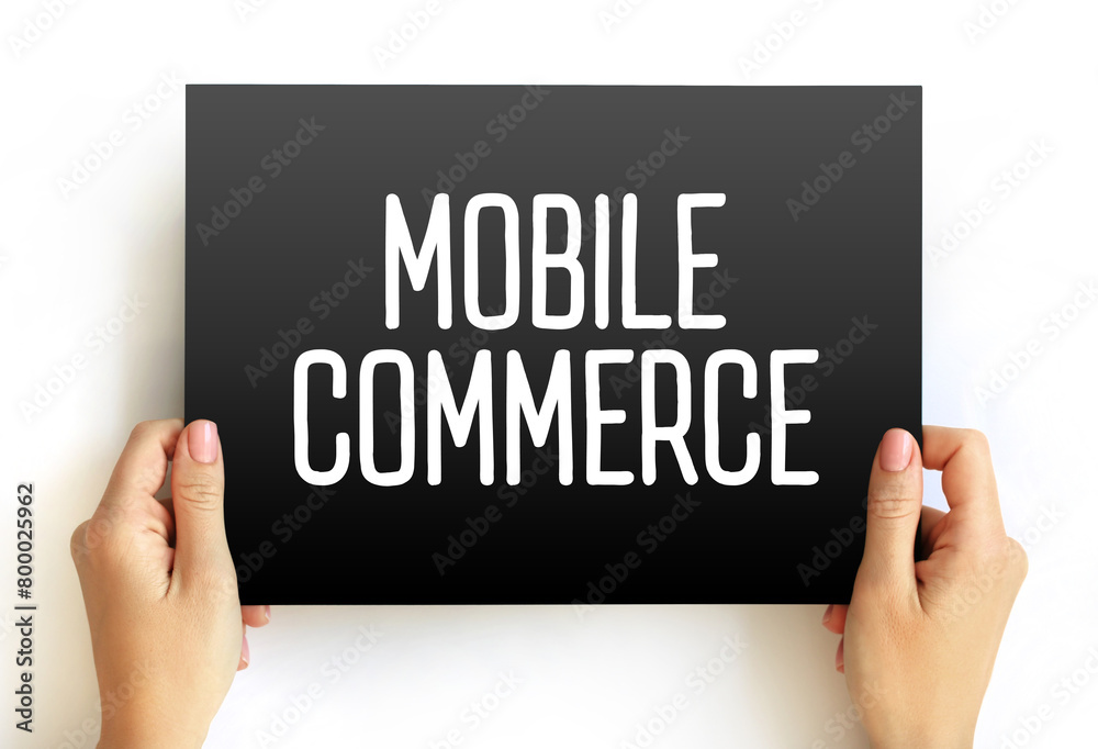Mobile Commerce - using wireless devices to conduct commercial transactions online, text concept on card Mobile Commerce - using wireless devices to conduct commercial transactions online, text concept on card