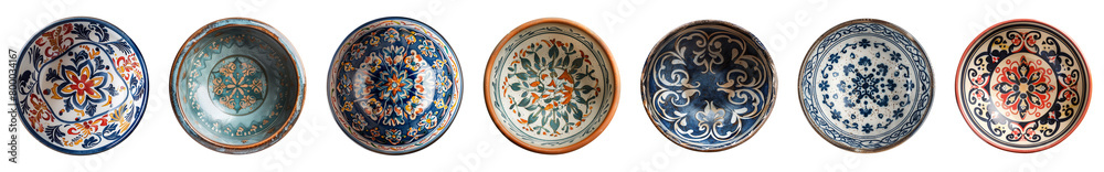 Collection of empty ceramic bowls or plates with a pattern or painted ornament isolated on a transparent background, view from above, cut out, PNG