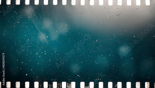 Abstract dirty or aging film. Dust particle and grain texture or dirt use for overlay film frame effect with space for vintage grunge design.
