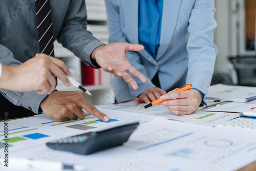 Team of business people working together in the meeting room office, teamwork background charts and graphs banner, double exposure successful teamwork,business planning concept.