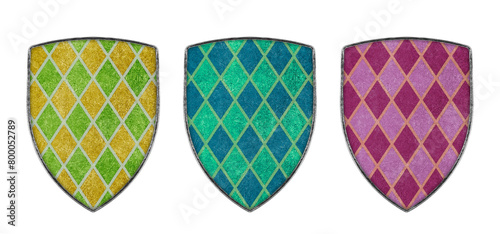 Old decorated colorful metal shields isolated on white background