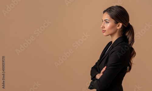 Young beautiful brunette business woman over isolated brown background looking to side © Danko