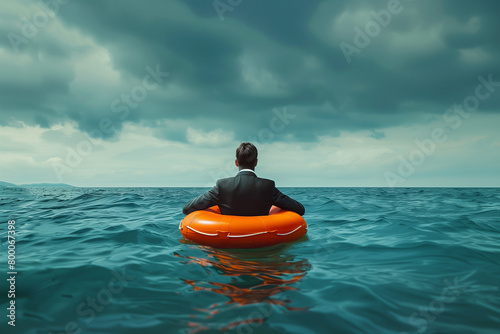 businessman using lifesaver in the sea, insurance and business consult concept