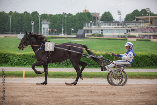 A jockey and his horse race on the Hippodrome track.