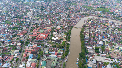 View of the city of Banjarmasin, South Kalimantan from a drone during the day photo