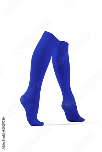 Close-up shot of a pair of blue shadow-proof knee socks with closely rims on the top. The pair of knee high socks are isolated on a white background. Side view. photo