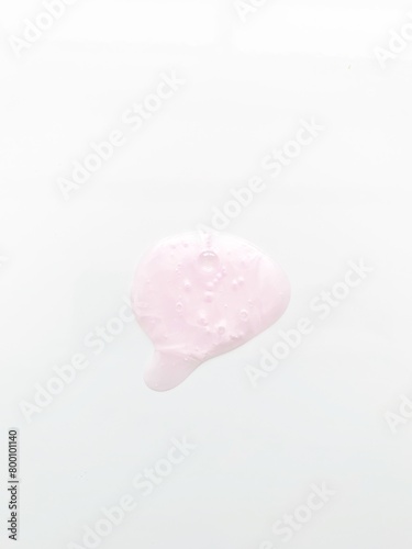 Hydrate Hyaluronic Acid Moisturizer Smear. Clear Drop of Liquid. A smear of colorful chemical products on a white background

