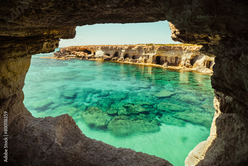 Sea cave arch viewpoint near Cape Greko, Capo Greco, Ayia Napa and Protaras on Cyprus island, Mediterranean Sea. Breathtaking seascape. Turquoise crystal clear waters in sunny day photo