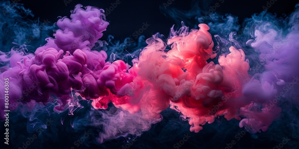 magenta and pink fluffy pastel ink smoke cloud against black background