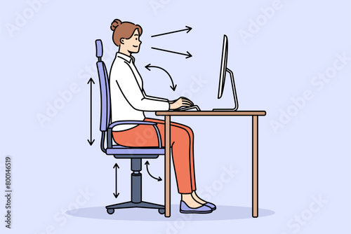 Woman demonstrates correct posture for working with computer, sitting with straight back at table with monitor. Girl follows rules of posture, typing on PC using ergonomic adjustable chair.