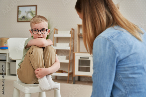 Little boy talking with the therapist