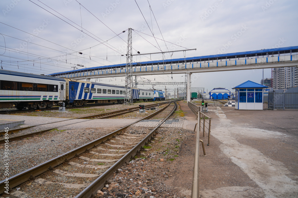 Pedestrian footbridge passing over the railway tracks at Tashkent North Station in Uzbekistan, Central Asia