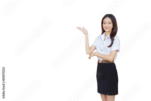 Portrait of an adult Thai student in university student uniform. Asian beautiful girl standing to present something confidently while isolated white background.