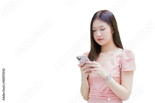 Young Asian professional business female with long hair is smiling while looking at the smartphone in her hand work from anywhere concept while isolated white background.