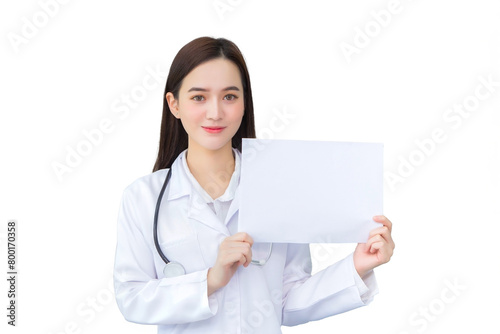 Young asian professional woman doctor who wears medical coat holds and shows white paper to present something in healthcare concept while isolated white background.