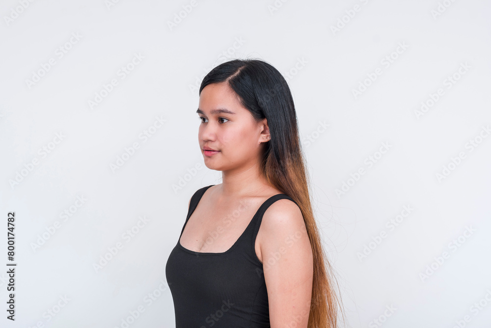 Elegant young Asian woman in a black bodysuit, isolated on white background Elegant young Asian woman in a black bodysuit, isolated on white background