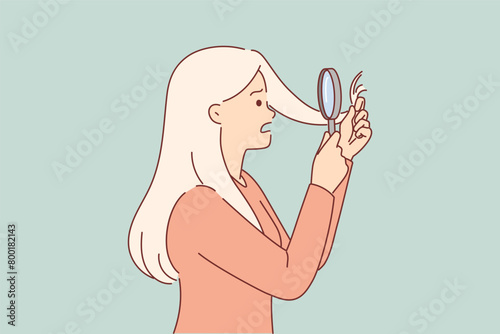 Split ends of hair bother girl with magnifying glass, needs trip to hairdresser.