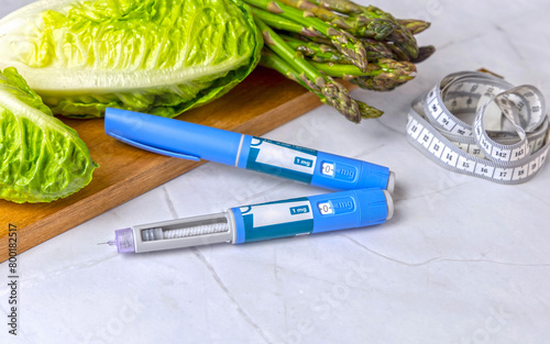 Original Danish Ozempic Insulin injection pen for diabetics and vegetables. photo