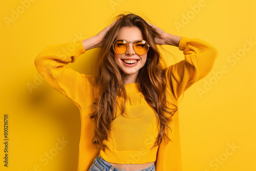 Full length photo of young excited lady have fun carefree chill hang-out club isolated over yellow color background 