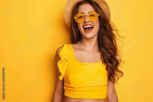 Full length photo of young excited lady have fun carefree chill hang-out club isolated over yellow color background
 photo