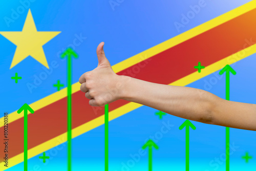 Congo Democratic Republic flag with green up arrows, increasing values and improving economy,  