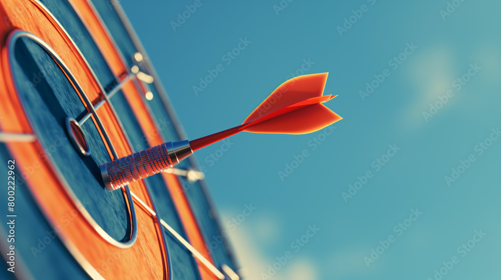 An orange dart perfectly sticks into the center bullseye of a bright wooden dartboard with a vivid blue sky backdrop An orange dart perfectly sticks into the center bullseye of a bright wooden dartboard with a vivid blue sky backdrop