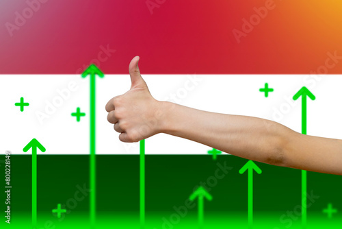 Yemen flag with green up arrows, increasing values and improving economy,  finger thumbs up front 
