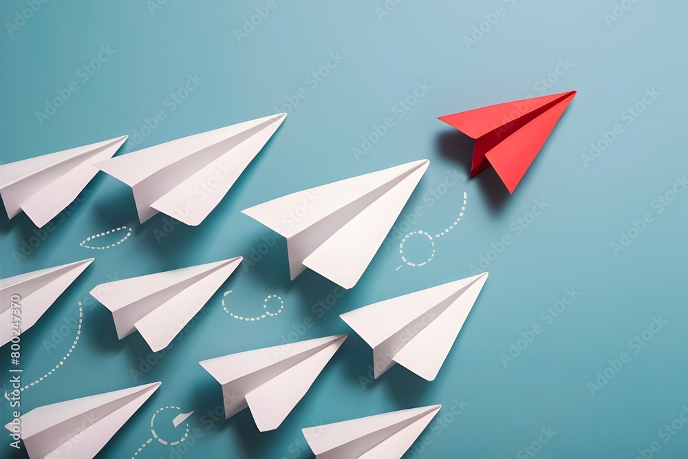 Innovative white paper airplanes on blue background, with red outlier, represent uniqueness and new perspectives Innovative white paper airplanes on blue background, with red outlier, represent uniqueness and new perspectives