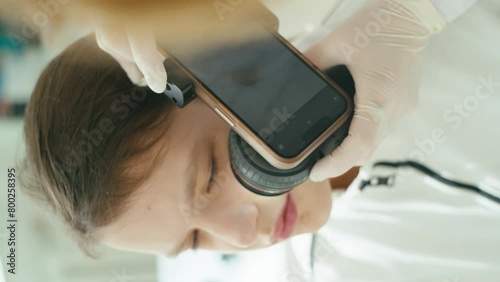 Checking moles is important for health. In the clinic, a detailed diagnosis of each mole with an enlarged image is carried out using a special device. High quality 4k footage
