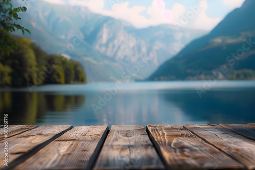 Wooden tabletop with blurred background of summer lake and mountain scenery. Concept Nature Photography  Landscape Background  Blurry Lake  Mountain Scenery  Wooden Tabletop