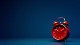 New and modern red alarm clock isolated on blue background