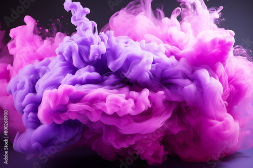 Explosion of light purple powder produced smoke on black background. Background Abstract Texture. Splashing paint is an art. Smoke spread throughout area.