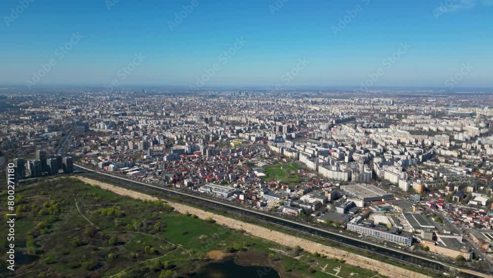 High angle drone shot of Vacaresti Nature Park in Bucharest. Natural reserve in the middle of the capital city of Romania. Swamp, bird's nests and paths for hiking and nature exploration.
High angle drone shot of Vacaresti Nature Park in Bucharest. Natural reserve in the middle of the capital city of Romania. Swamp, bird's nests and paths for hiking and nature exploration.