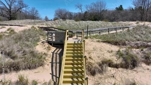 Moving toward the raw lumber staircase for dune transversal. photo