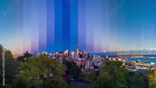 Seattle Downtown Skyline Day To Night Timelapse with Space Needle and a colorful sky photo
