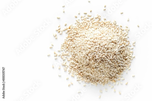 White sesame seeds viewed from above against white background