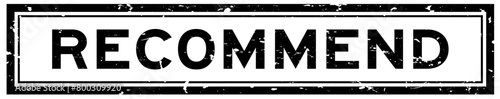 Grunge black recommend word square rubber seal stamp on whtie background