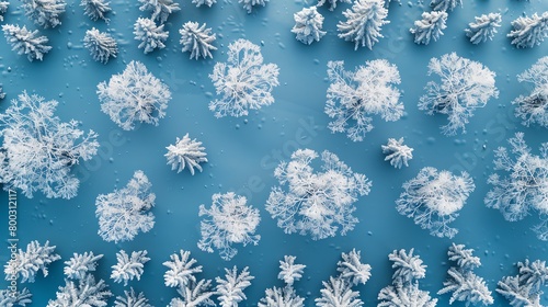 Winter trees with snow, seamless pattern, icy blue background, perfect for a seasonal outdoor magazine cover, aerial perspective