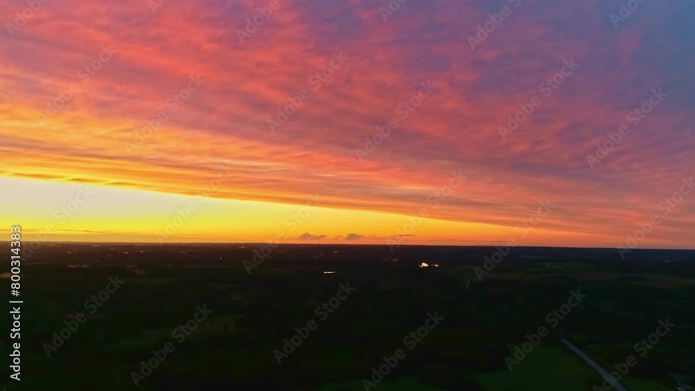 Aerial view during colorful golden hour sunset with clouds
Aerial view during colorful golden hour sunset with clouds